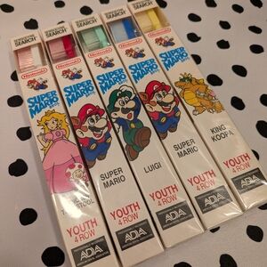 VINTAGE 1991 Nintendo Super Mario Character Toothbrush Set